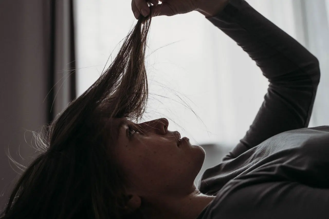 Girl worried about hair loss